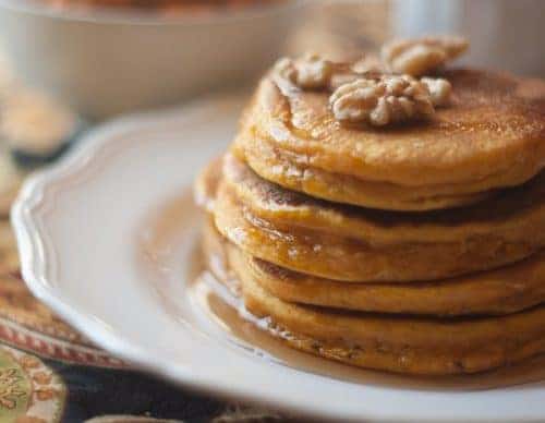 Hearty Pumpkin Pancakes Recipe from All She Cooks. Part of the Fall In Love With Fall Series at Hi! It's Jilly. #recipe #pumpkin #fall