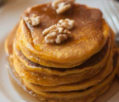 Hearty Pumpkin Pancakes Recipe from All She Cooks. Part of the Fall In Love With Fall Series at Hi! It's Jilly. #recipe #pumpkin #fall