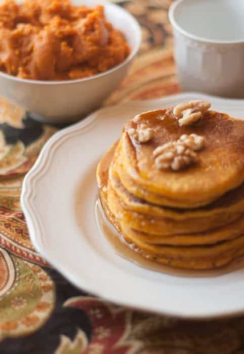 Hearty Pumpkin Pancakes Recipe from All She Cooks. Part of the Fall In Love With Fall Series at Hi! It's Jilly. #recipe #pumpkin #fall