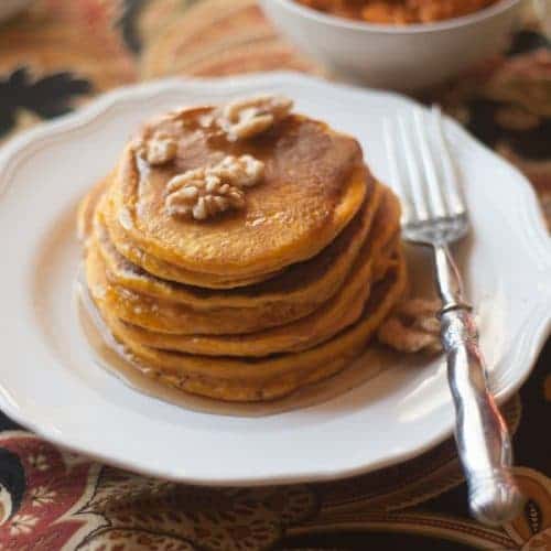 Hearty Pumpkin Pancakes Recipe from All She Cooks. Part of the Fall In Love With Fall Series at Hi! It's Jilly. #recipe #pumpkin #fall