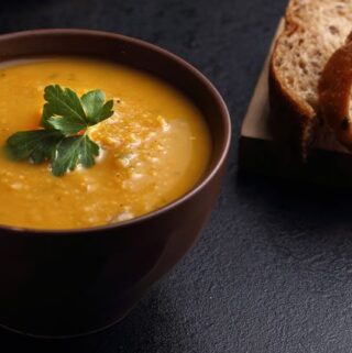 Pumpkin Soup recipe is a perfect way to use up pureed pumpkin from your garden. This hearty winter soup is soothing and healthy.