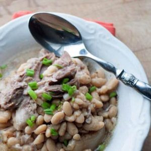 White Beans and Ham Budget Meal. White Beans and Ham is a simple budget meal that feeds a crowd and tastes great. This is one of those slow cooker recipes you can make ahead of time and have ready for a crowd. Stress free meal that feeds a lot of people.