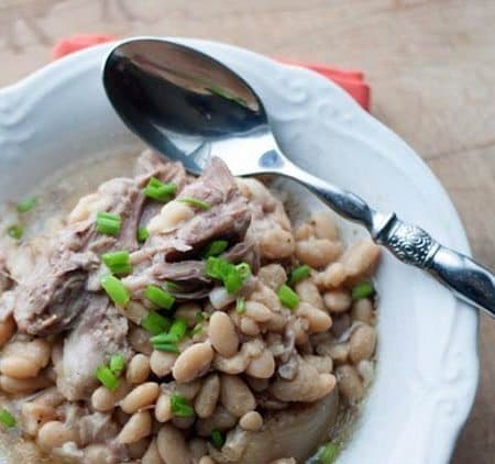 White Beans and Ham Budget Meal. White Beans and Ham is a simple budget meal that feeds a crowd and tastes great. This is one of those slow cooker recipes you can make ahead of time and have ready for a crowd. Stress free meal that feeds a lot of people.