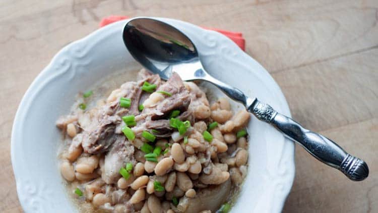 White Beans and Ham Budget Meal. White Beans and Ham is a simple budget meal that feeds a crowd and tastes great. This is one of those slow cooker recipes you can make ahead of time and have ready for a crowd. Stress free meal that feeds a lot of people.