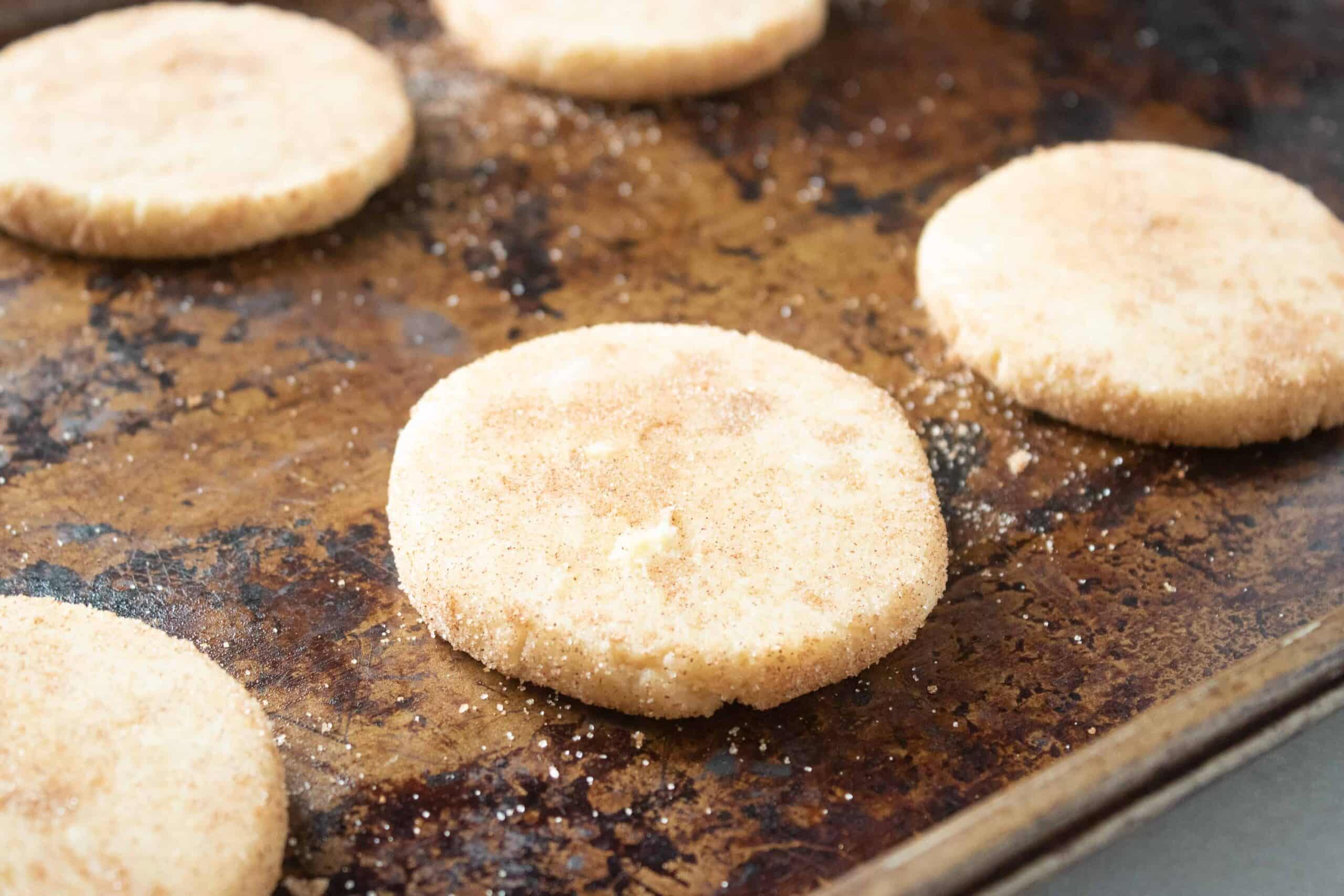snickerdoodle cookies on baking sheet