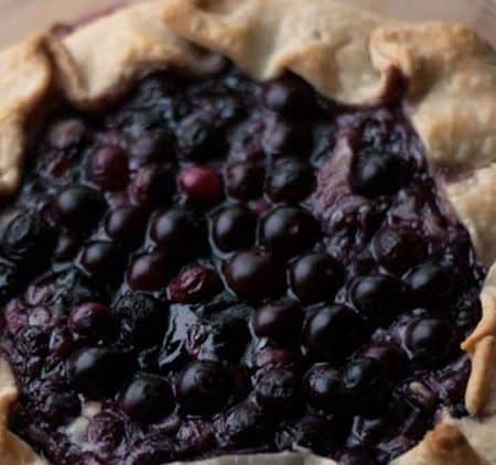 Quick and easy dessert recipe for blueberry tart with cream cheese filling. Use fresh blueberries and enjoy this dessert in no time.