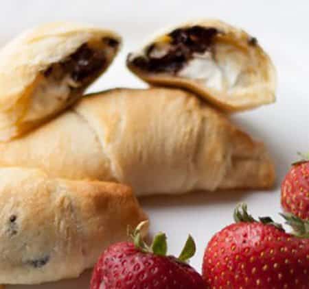 Chocolate Cream Cheese Croissants recipe is a quick and easy breakfast recipe to fancy up any breakfast or brunch. Served with strawberries.