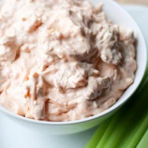 Buffalo Chicken Dip with Celery- try something new every day Ready for Game Day? Crunchy and spicy and oh so good.