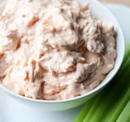 Buffalo Chicken Dip with Celery- try something new every day Ready for Game Day? Crunchy and spicy and oh so good.