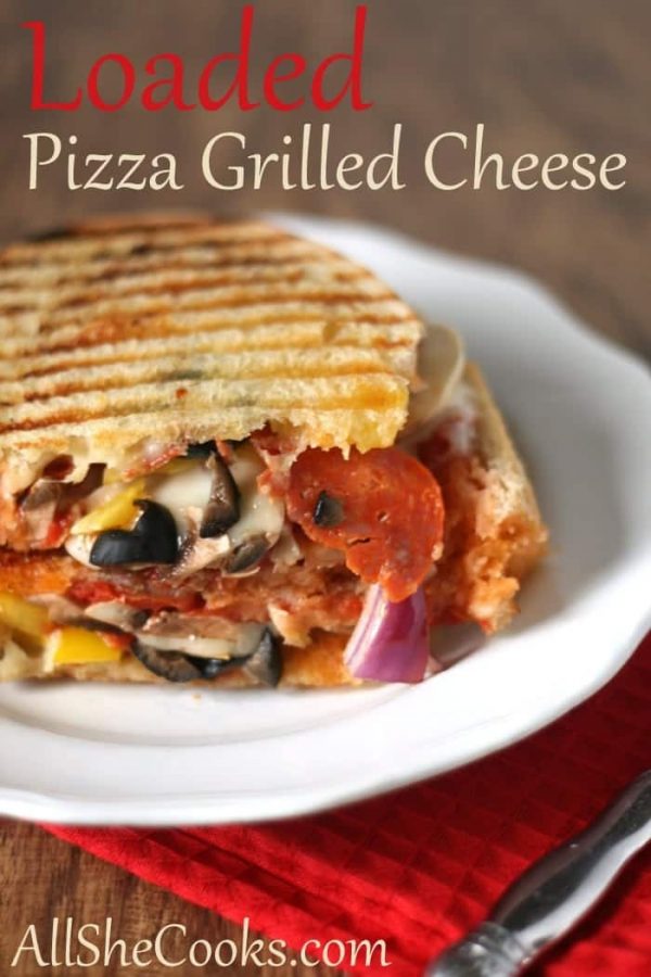 Loaded Pizza Grilled Cheese Sandwich is loaded to the max with the best pizza toppings around. Cheesy goodness and the best sandwich recipe around.