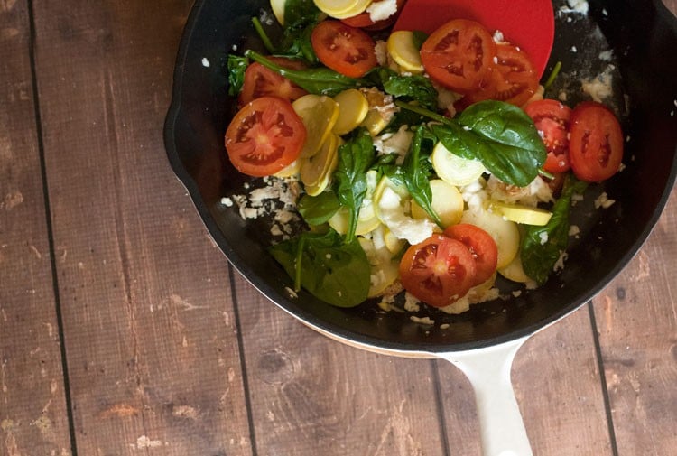 egg white scramble in cast iron pan with white handle