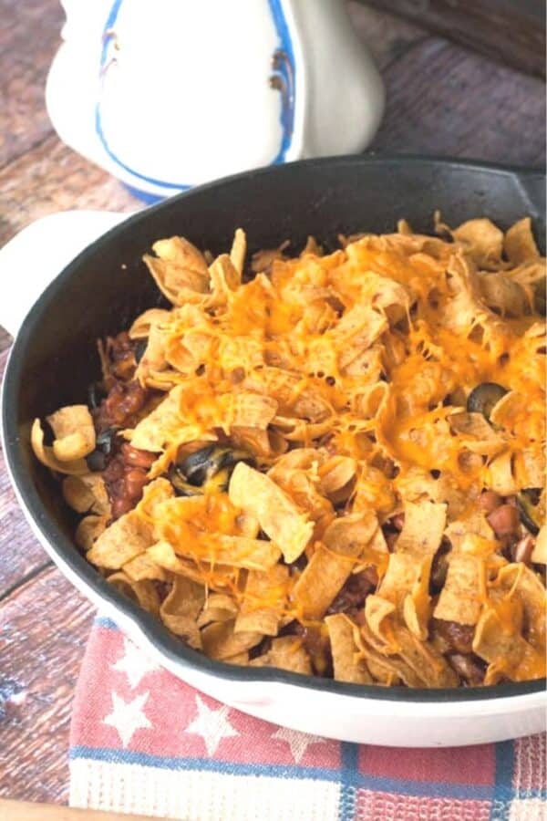close up of casserole topped with corn chips