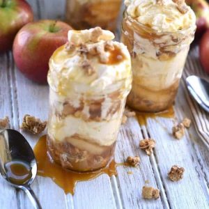 Love Mason Jar Desserts? So do we! This Apple Pie Caramel Cheesecake Recipe is so easy to make. We love sharing easy no bake dessert recipes!