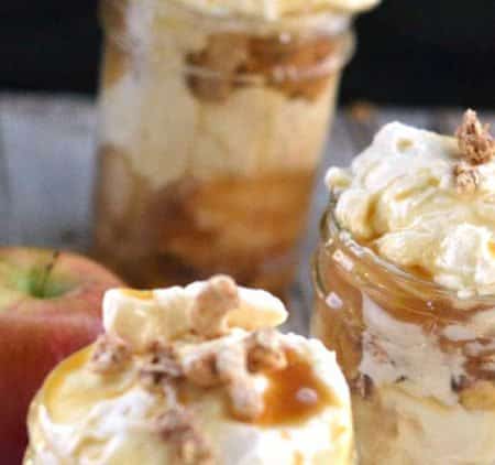 Love Mason Jar Desserts? So do we! This Apple Pie Caramel Cheesecake Recipe is so easy to make. We love sharing easy no bake dessert recipes!
