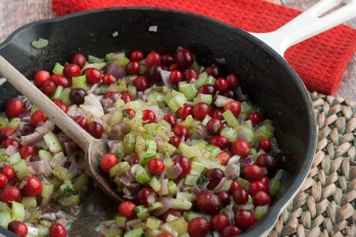 homemade cranberry stuffing being cooked on stovetop