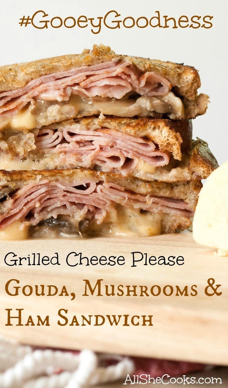 close up of gouda grilled cheese sandwich with ham and mushrooms