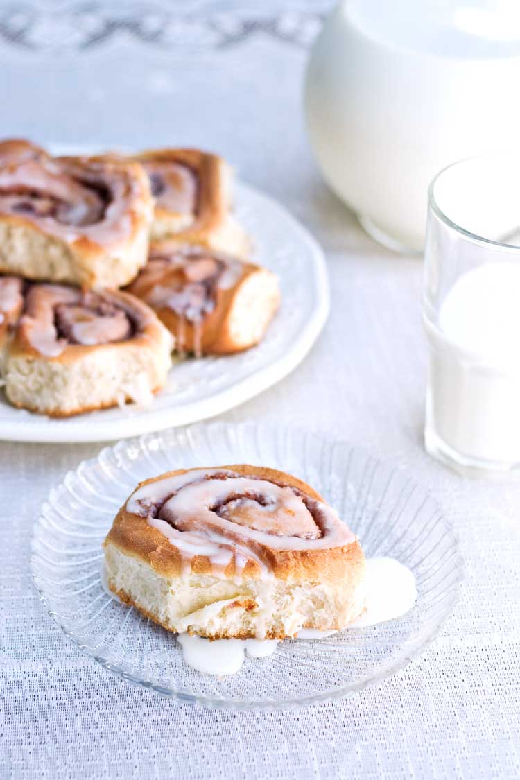 cinnamon rolls on white plates