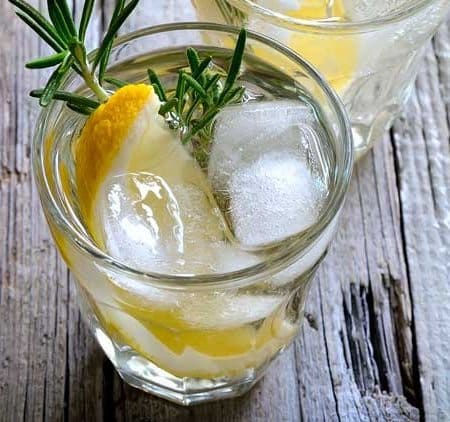 Angelo Fizz Cocktail. This cocktail is a perfect blend of lemon with a herb flavored twist of rosemary. Serve this tasty lemon cocktail recipe on the rocks for happy hour, and it is also a great drink to serve poolside.