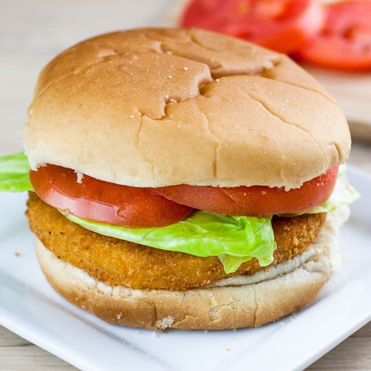 fried chicken sandwich on white plate