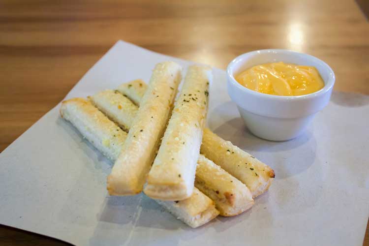 breadsticks on parchment paper