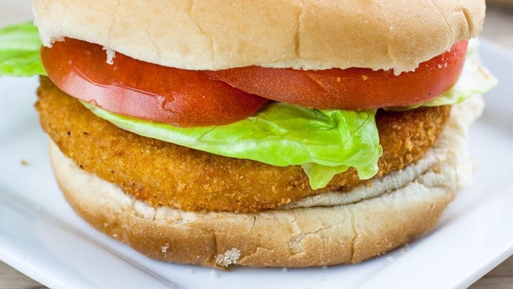 fried chicken sandwich on white plate