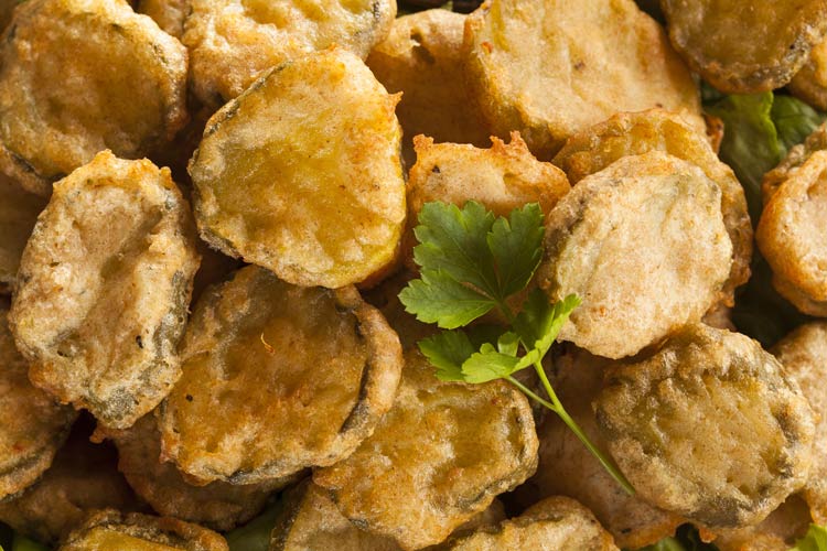 fried pickles with cilantro on top