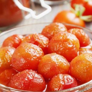 Canning tomatoes. Learn how to can tomatoes with this easy recipe that you can use every year to can tomatoes from your garden or farm stand. Canning tomatoes is easy and they are so tasty when captured at the peak of ripeness.