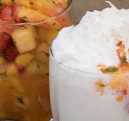 Mango Smoothie Recipe. Simple and decadent tropical smoothie recipes with fresh fruit. Pineapple, mango and strawberries blended with coconut make this a refreshing smoothie that is a perfect summer drink. Grab a spoon and a straw and dig in to this delicious smoothie.