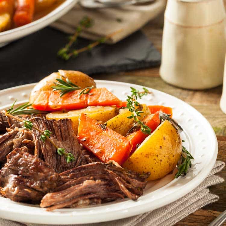 Crockpot Roast Beef Recipe is delicious! Making Pot Roast in the slow cooker is just about the easiest dinner that you can make. Learn how to make this crock pot meal in no time. It's an easy weeknight meal because you can toss all the ingredients in the slow cooker in the morning and have dinner ready when you get home. This is how a perfect pot roast slow cooker meal is made.