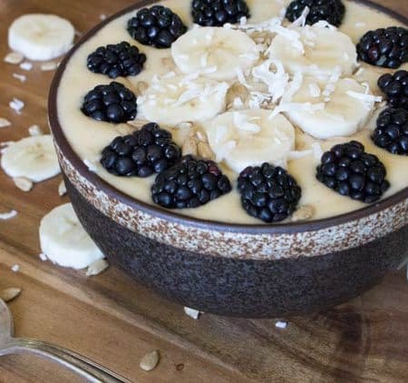 Blackberry Smoothie Bowl Recipe. Delicious mango, banana and blackberry smoothie bowl that is made with healthy whole food ingredients. This is a good for you snack or breakfast, filling and just plain gorgeous. Smoothie bowl recipes are the latest craze, so you'll want to catch up with this one.