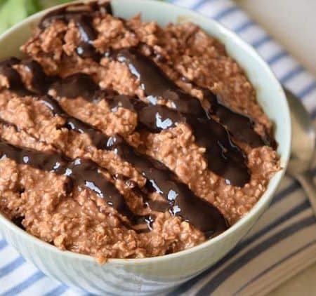 New breakfast idea: Overnight Slow Cooker Hot Chocolate Oatmeal with Steel Cut oats. Absolutely yummy. This is a delicious breakfast recipe you'll truly enjoy. Overnight oatmeal is such a time saving recipe.