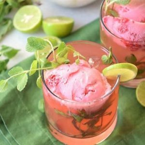 Try this fun cocktail float. This Strawberry Mojito Float is a refreshing alcoholic beverage perfect for sharing with friends or for an evening cocktail.