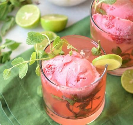 Try this fun cocktail float. This Strawberry Mojito Float is a refreshing alcoholic beverage perfect for sharing with friends or for an evening cocktail.