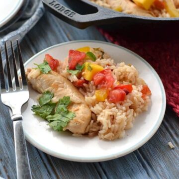 one pot mango chicken being served
