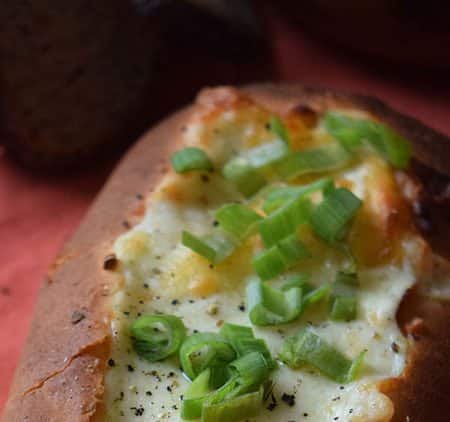 Triple Cheese Stuffed Bread is an amazing appetizer recipe that is perfect for serving before a meal or as a side with soup. Try it for dinner tonight.