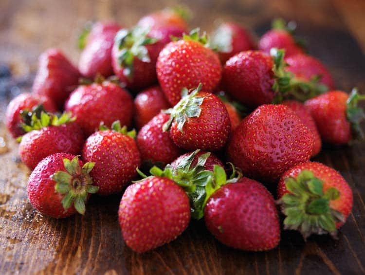 strawberries on wood table