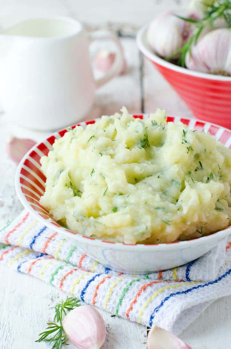 garlic mashed potatoes in a pretty serving bowl