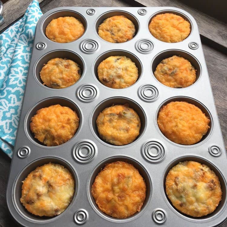 breakfast egg muffins being baked in a muffin tin