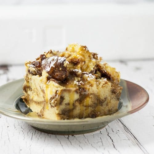 An easy and delicious bread pudding recipe for your crockpot, full of eggs, cream, cinnamon, panettone , and brandy. Don't forget the brandy!