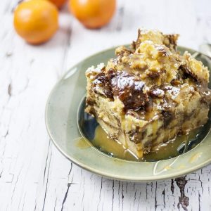 An easy and delicious bread pudding recipe for your crockpot, full of eggs, cream, cinnamon, panettone , and brandy. Don't forget the brandy!