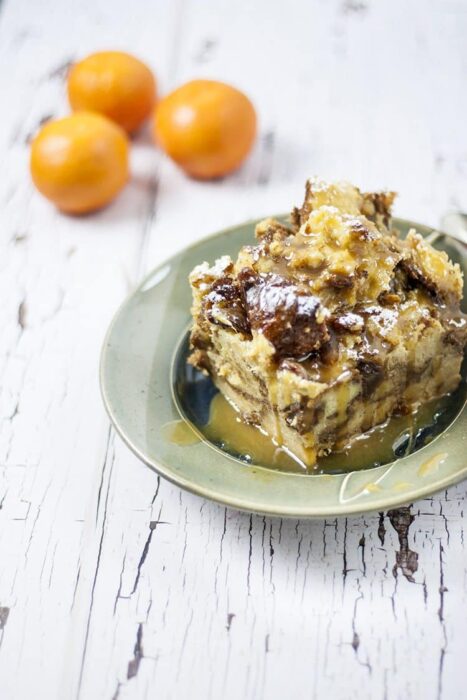 An easy and delicious bread pudding recipe for your crockpot, full of eggs, cream, cinnamon, panettone , and brandy. Don't forget the brandy!