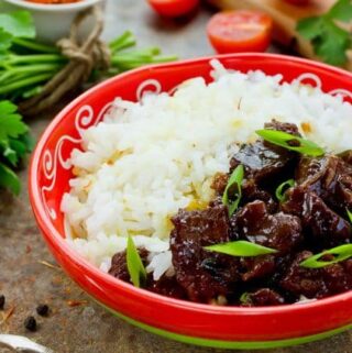 You will love this inspired Copycat Mongolian Beef recipe served with white rice. Easy to make at home and every bit as tasty as the restaraurnt recipe.