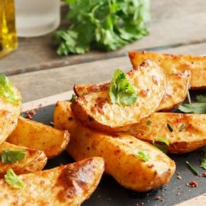 Enjoy our savory potato wedges with paprika. Add some fresh herbs, a dab of sour cream and they are ready to serve. Delish!