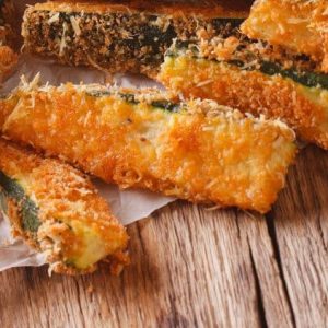How to make Baked Zucchini Sticks for a healthier zucchini sticks option. Tasty appetizer served with marinara.