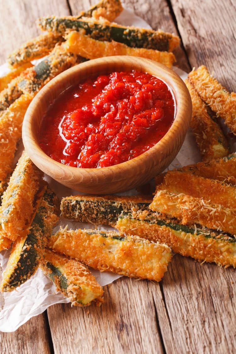 How to make Baked Zucchini Sticks for a healthier zucchini sticks option. Tasty appetizer served with marinara.