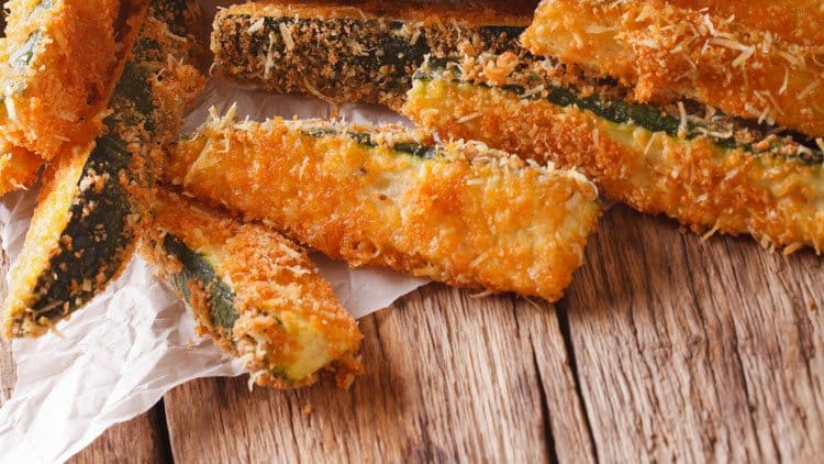 How to make Baked Zucchini Sticks for a healthier zucchini sticks option. Tasty appetizer served with marinara.