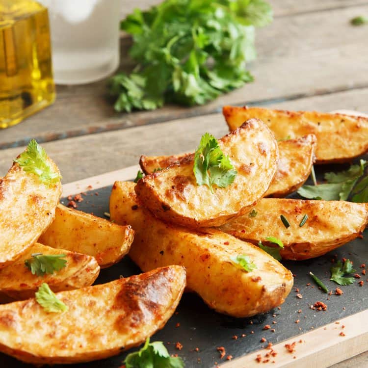 Enjoy our savory potato wedges with paprika. Add some fresh herbs, a dab of sour cream and they are ready to serve. Delish!