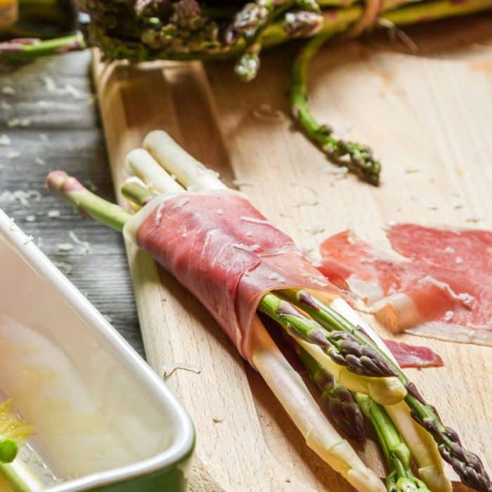 Enjoy Prosciutto Wrapped Asparagus as an appetizer or side dish recipe. This classic recipe is flavorful and always a popular recipe at parties.