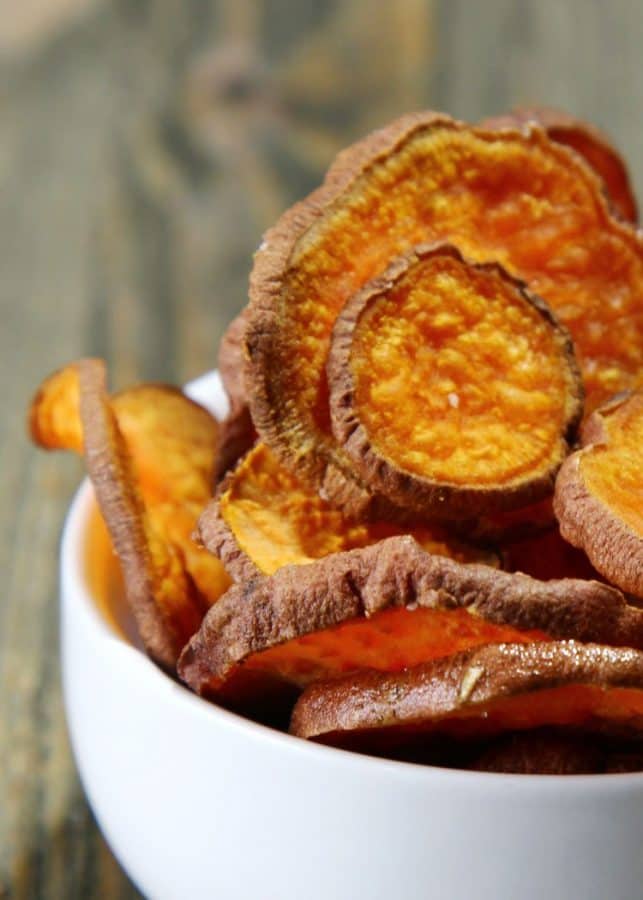 Make these healthy baked sweet potato chips in the oven or your excalibur dehydrator. Best sweet potato chips recipe ever.