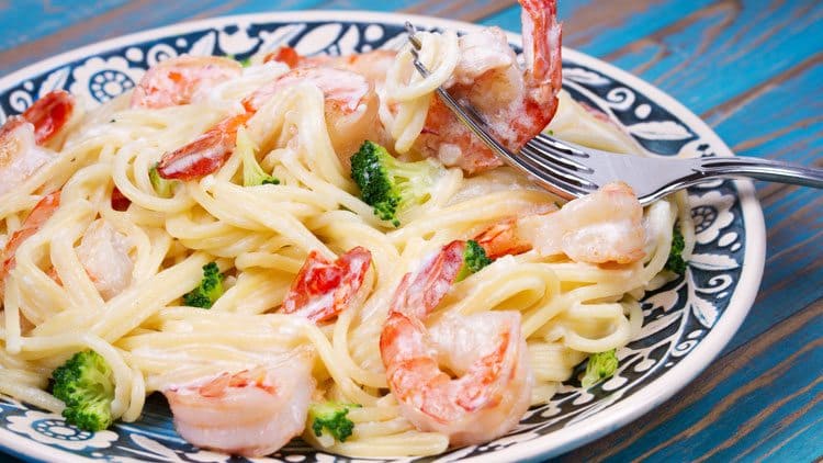 Enjoy this easy shrimp pasta recipe. Simple recipe with creamy pasta, shrimp and some broccoli. The sauce mixes up quickly and is so tasty. creamy-pasta-with-shrimp